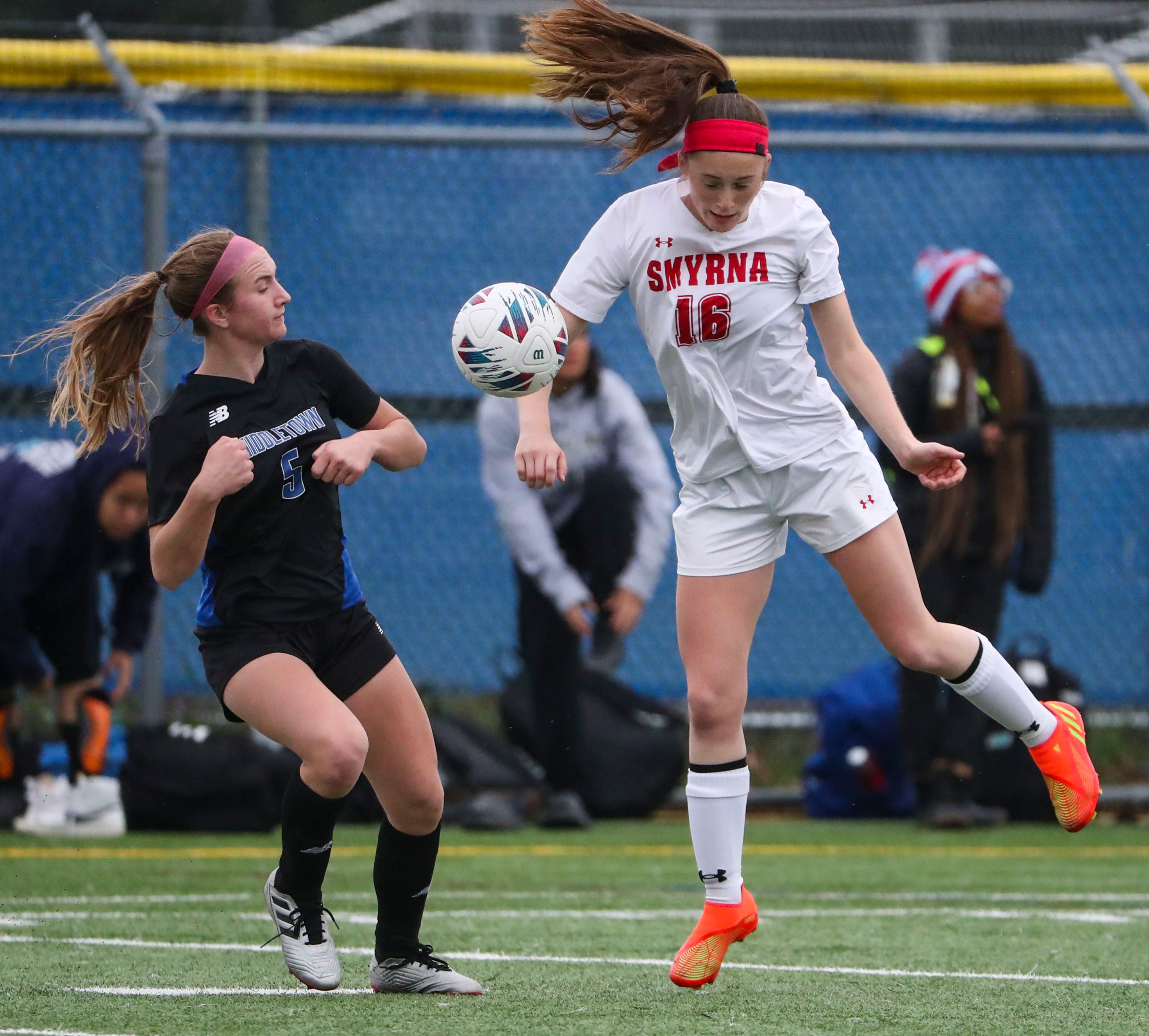Middletown's Flannery Grimm works against Smyrna's McKenna Wilson in the first half of the Cavaliers' 5-0 win at Middletown, Thursday, March 28, 2024.